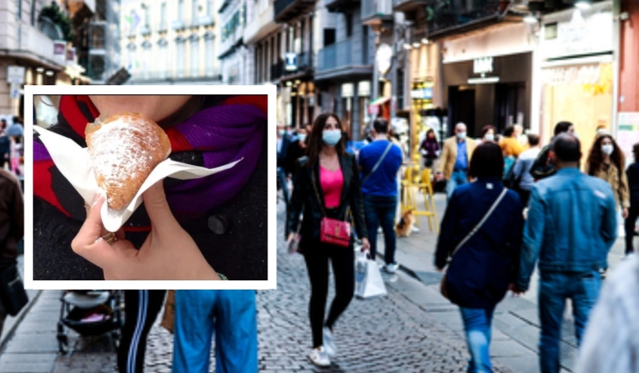 Napoli, abbassa la mascherina per mangiare un dolce: 400 euro di multa in via Toledo